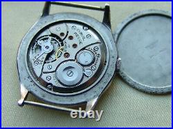 34 mm MEN'S WWII era REVUE WRISTWATCH working for parts or repair as is