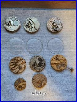 Lot of pocket watch movements for repair or parts