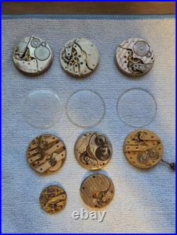 Lot of pocket watch movements for repair or parts