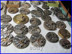 Pocket watch movements & parts for repair or tramp art/about 45 items/some comp